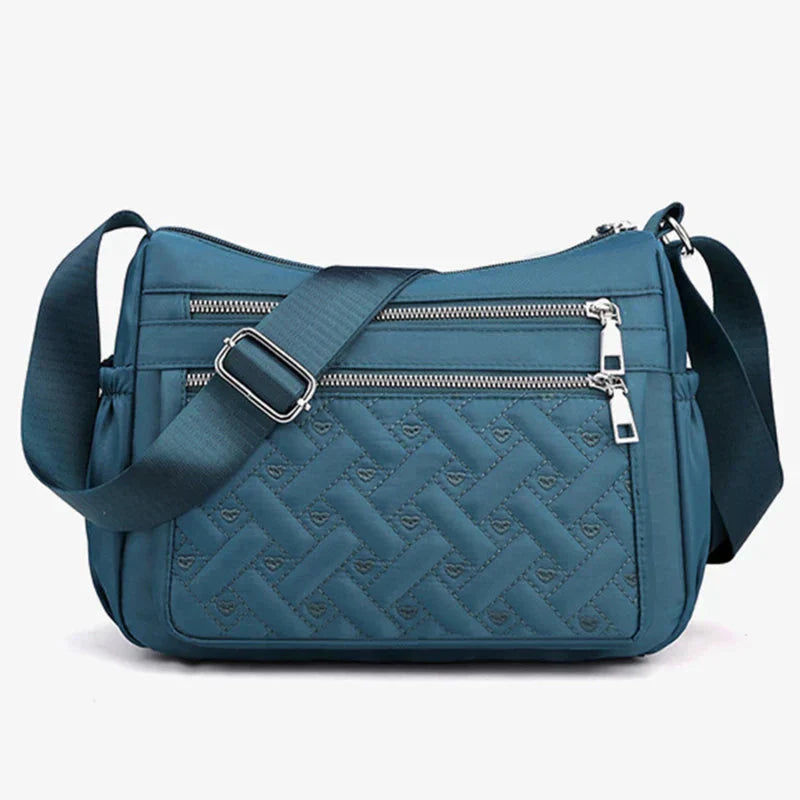 Aranya™ | Nylon skulderveske med budbringer