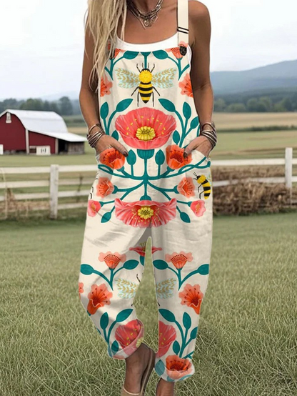 OLIVIA – SOLNEDGANG BLOMST VIDDE JUMPSUIT