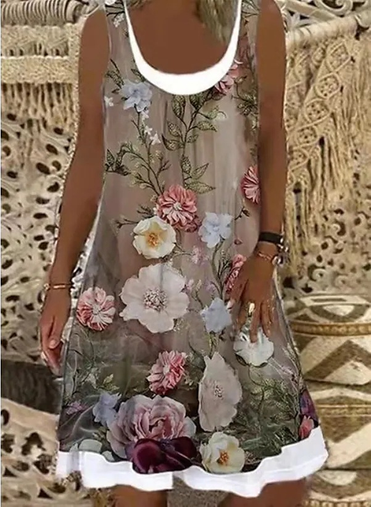 Jorid | Uformell ermeløs minikjole med blomsterprint